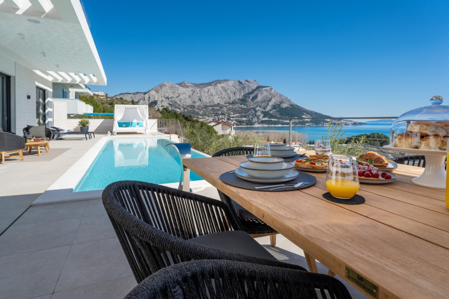 Enjoy the summer sun in this magnificent environment and view