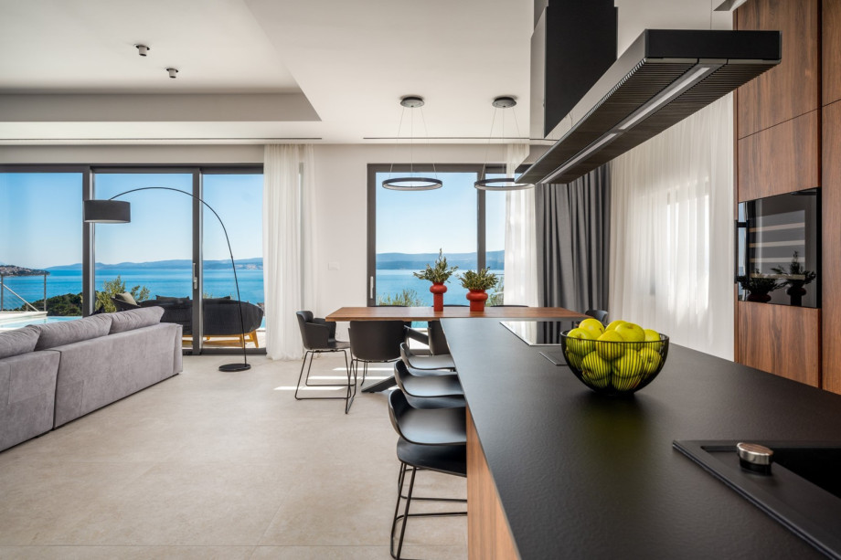 The kitchen island has all the amenities a modern guest needs.