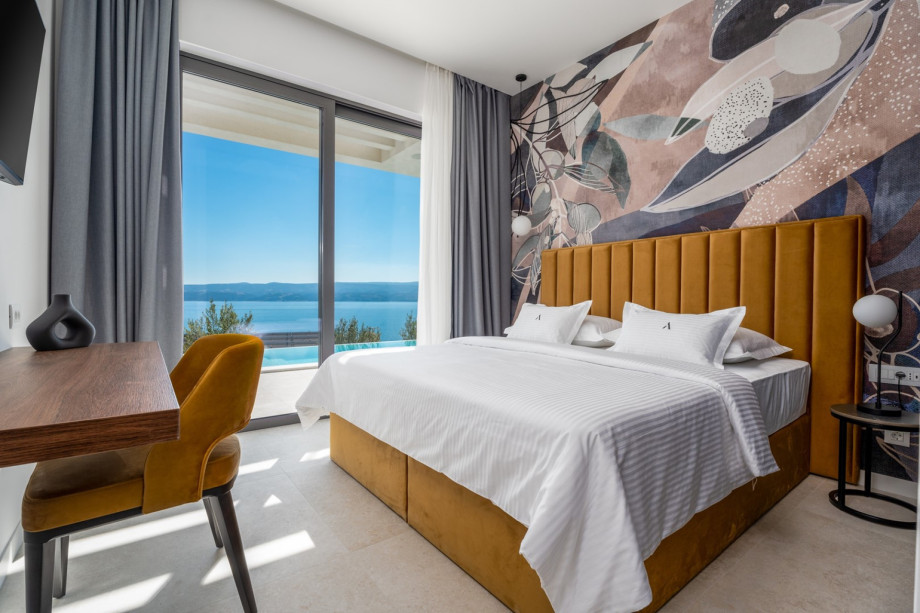 Bedroom No1 (25sqm) with a king size 180cm x 200cm, A/C, TV, en-suite bathroom.