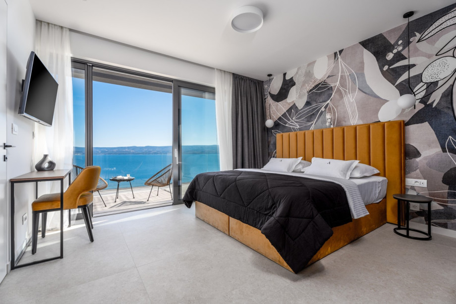 Master Bedroom No3 (28 sqm) with a king size 180cm x 200cm, A/C, TV.