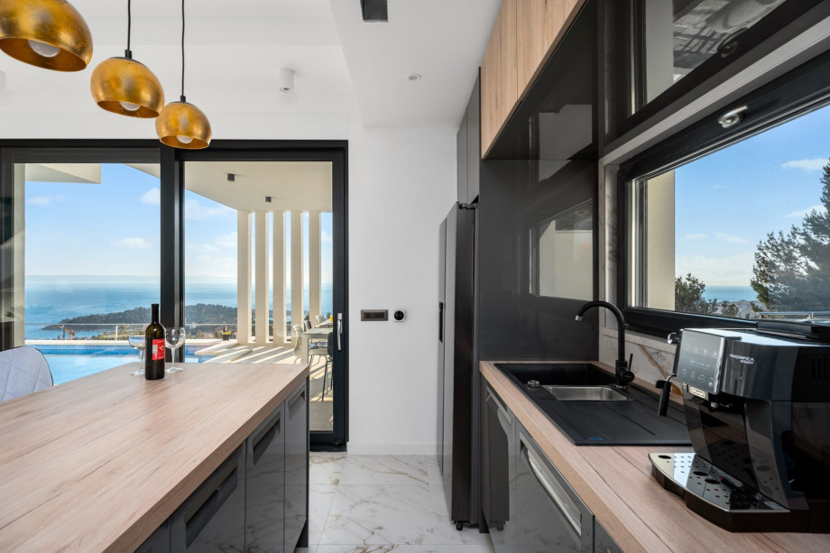 The kitchen island has all the amenities a modern guest needs.