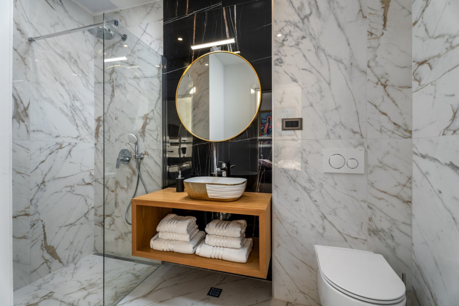 En-suite bathroom with a shower.