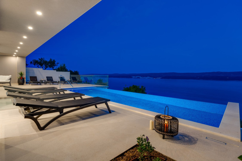 A terrace with amazing sea views, and sun deck chairs for 10 people.