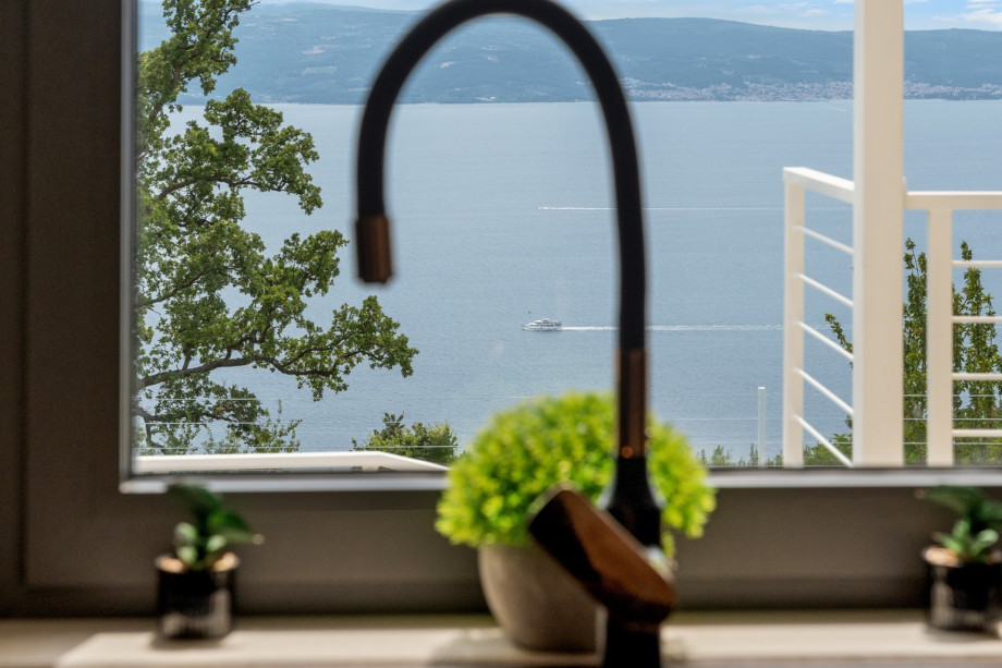 The panoramic sea views from the kitchen area are breathtaking.