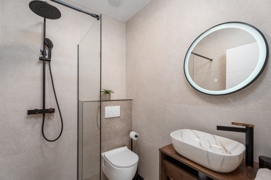 A Family bathroom No2 with a shower.