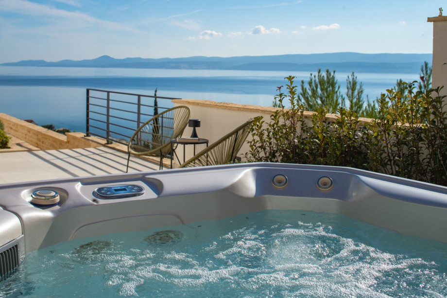 The panoramic sea views from the jacuzzi area are breathtaking.