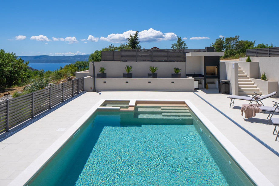 A heated pool with a fully automated salt electrolysis system