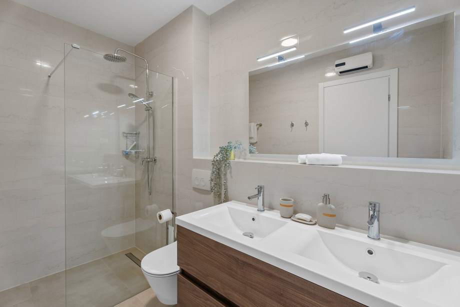 En suite bathroom with  a shower.