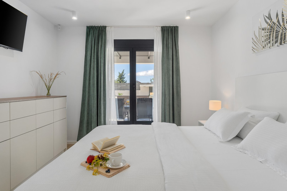 Super king-size bed measuring 200 cm by 220 cm