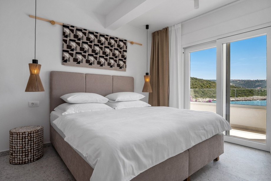 Bedroom NO1 with a king size bed 180cm x 200cm, A/C, a TV