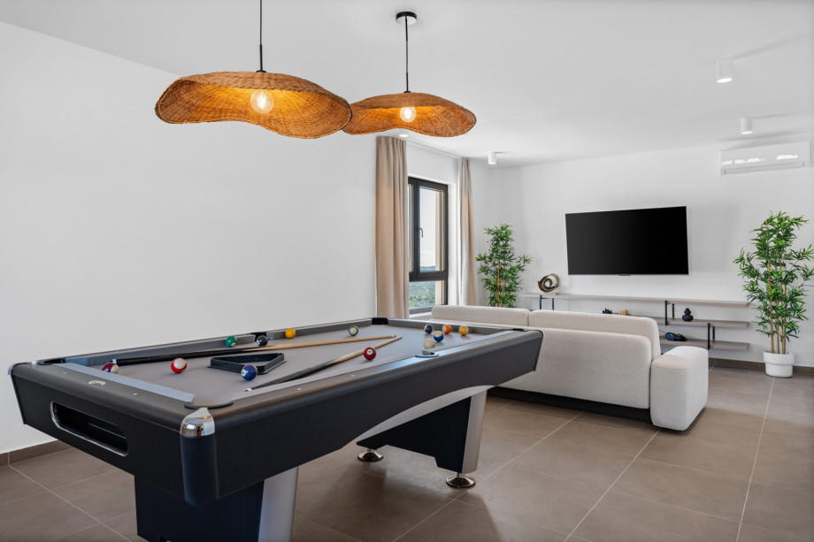 The 1st floor offers a Media room (Playroom) with a Billiards (pool table)