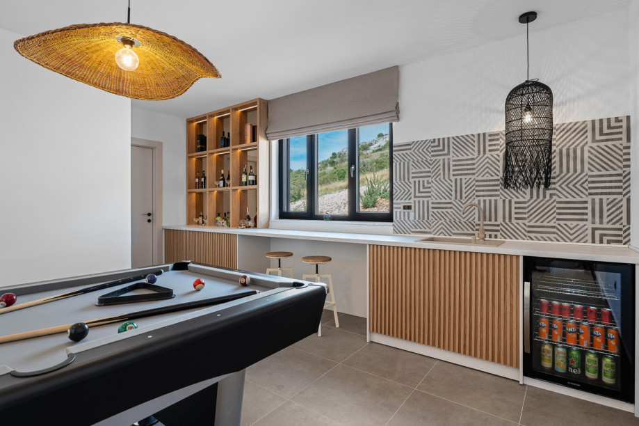 The 1st floor offers a Media room (Playroom) with a Billiards (pool table),