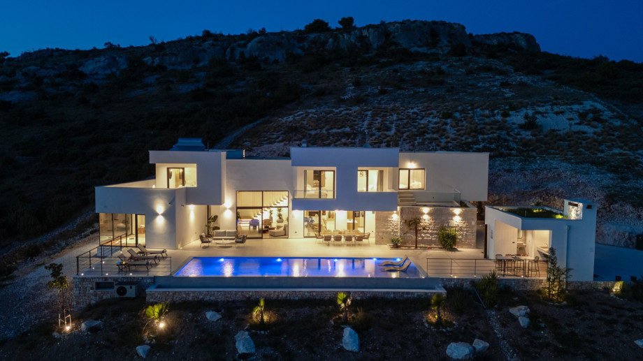 The whole property is fully fenced, and there are 4 parking places on the private plot