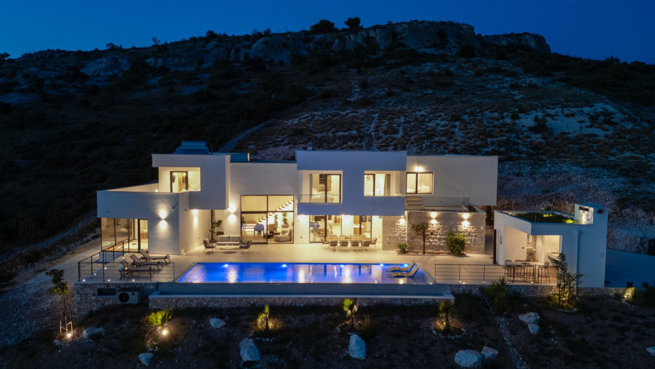 The whole property is fully fenced, and there are 4 parking places on the private plot