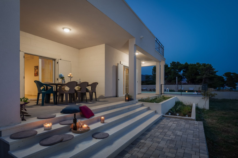 Enjoy meals at the dining table or step outside to the outdoor dining area for a more picturesque setting