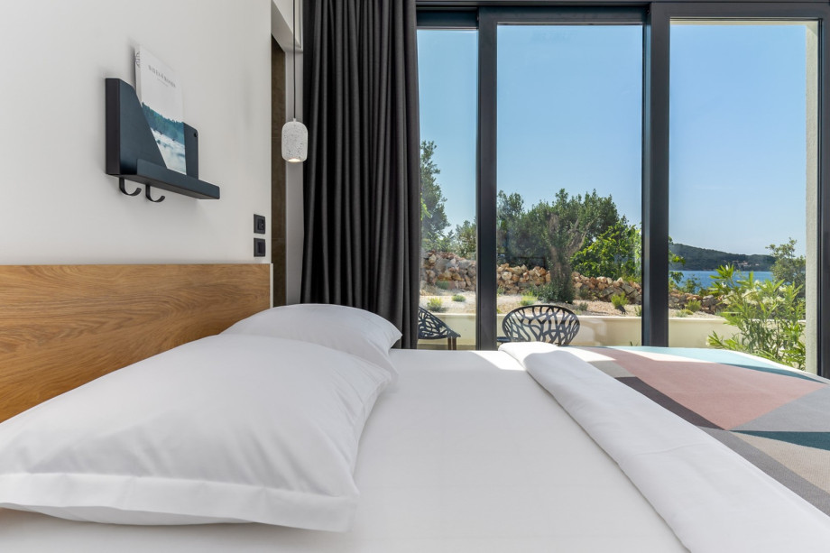 Bedroom No1 with a king size bed 180cm x 200cm, en-suite bathroom with a shower, and a terrace