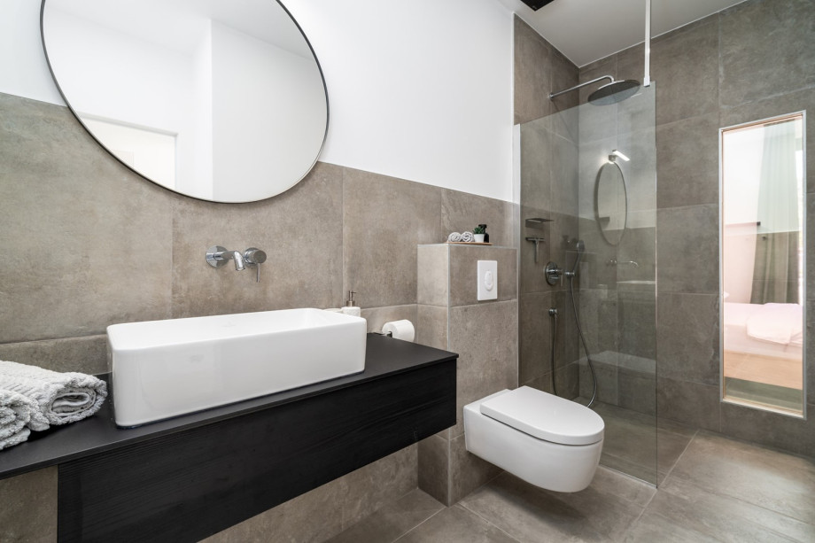 en-suite Badezimmer mit Dusche