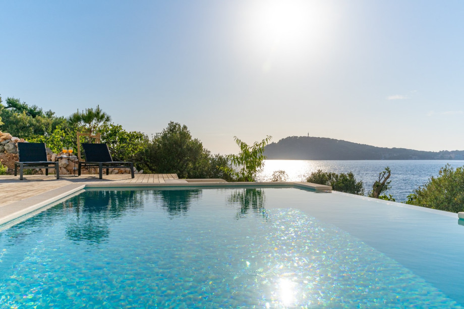 heated, infinity, private swimming pool with hydro-massage