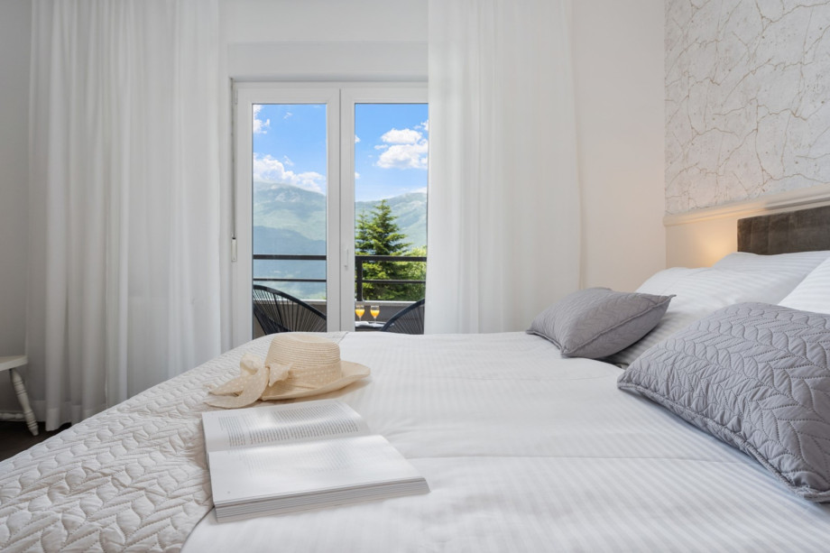 Bedroom No4 is equipped with an air-conditioner and a balcony