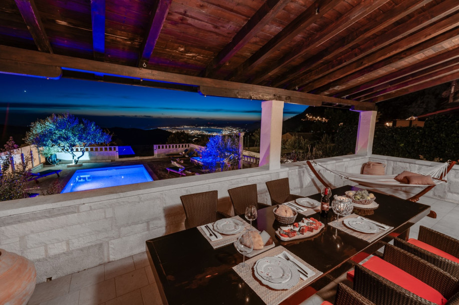 The covered dining area perfect for family or a romantic dinner