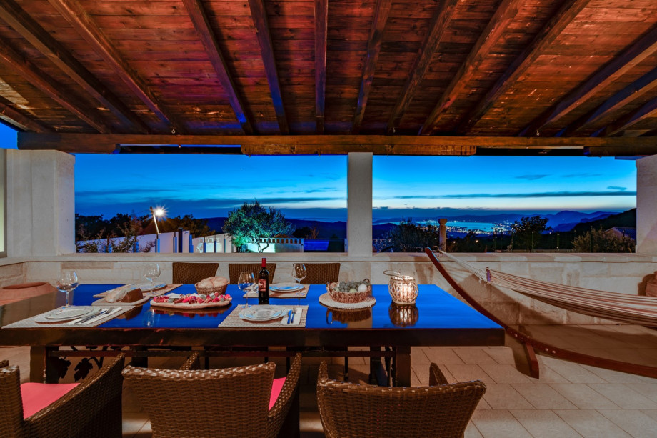 The covered dining area perfect for family or a romantic dinner