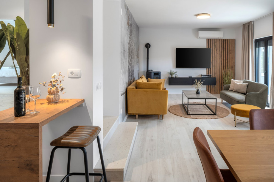 sofa (that can convert into a sofa bed (140cm x 200cm), a TV and PlaysStation5