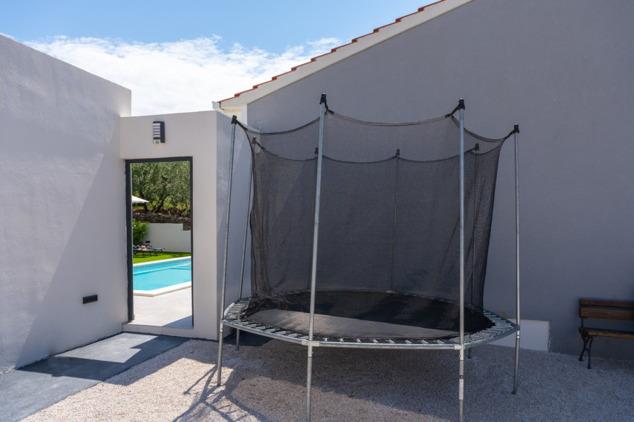 trampolin next to the parking lot