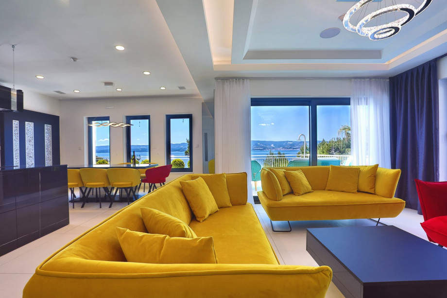 The ground floor offers a spacious living and dining room