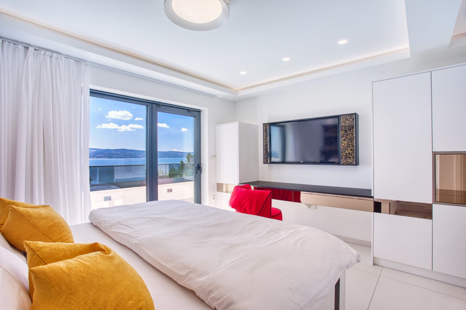 A Bedroom No2 also offers an entrance to the balcony with a sea view