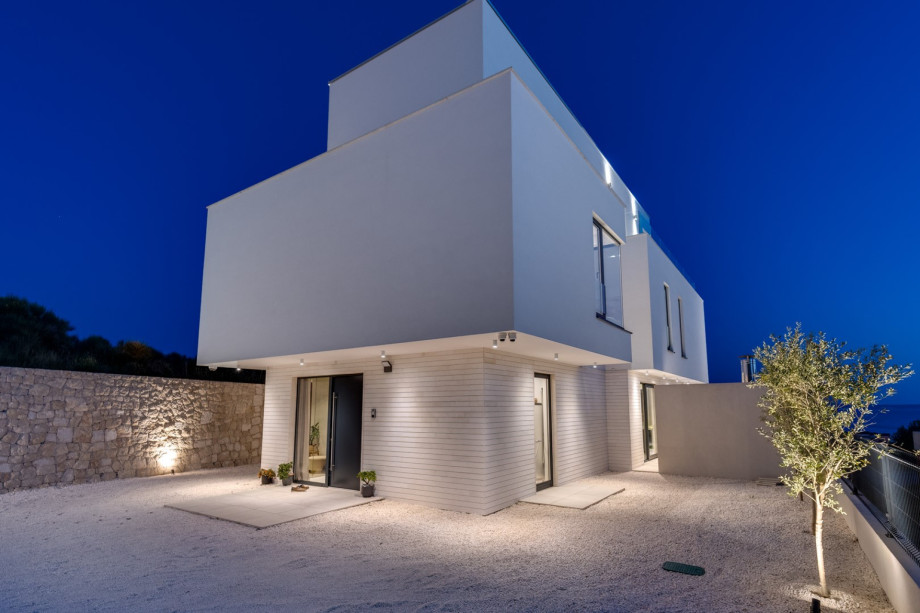 There is a parking lot on the private property for 4 cars, fenced