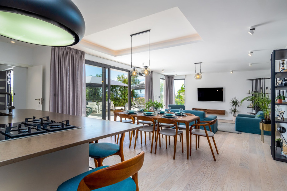 A very high standard fully fitted kitchen with prestige appliances and a dining area for 8 people.