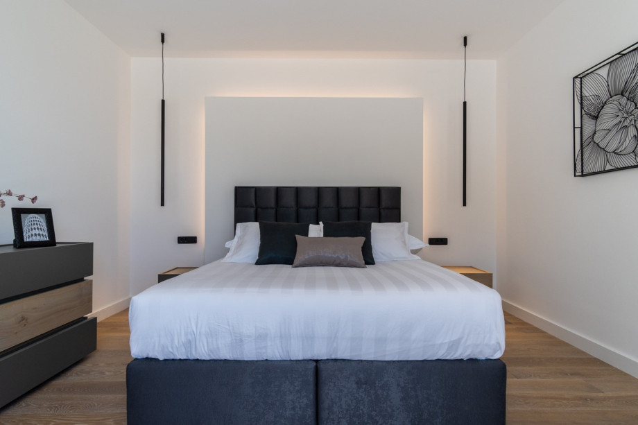 Bedroom No1 offers a walk-in closet, and an en-suite bathroom with a shower.