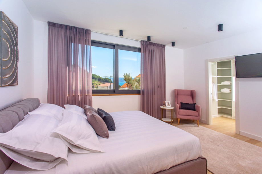 Bedroom No3 located on the first floor offers A/C, TV, and views on the landscape and the sea.