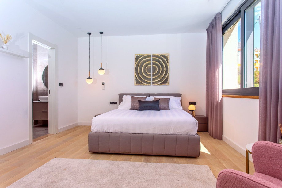 Bedroom No 3 with a double bed 160cm x 200cm offers a walk-in closet and an en-suite bathroom with a shower.