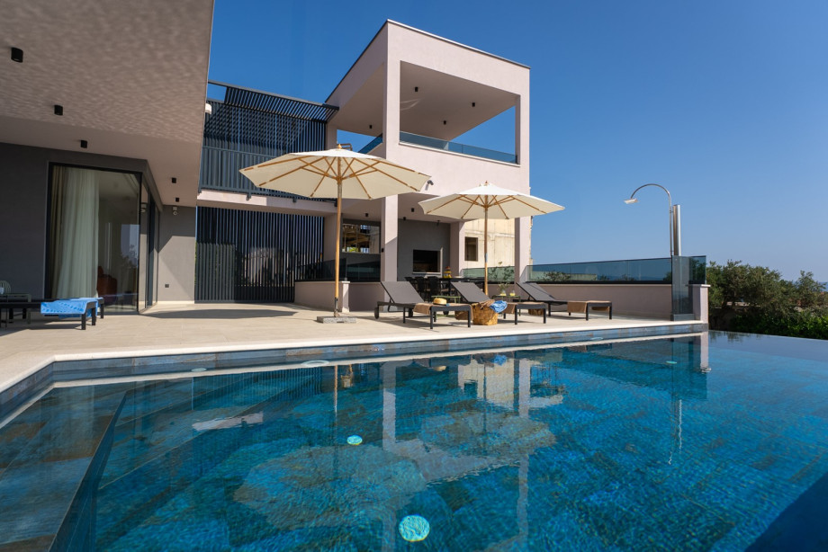 Outdoor Features: 8 sun loungers with umbrellas on a sea-facing sun deck