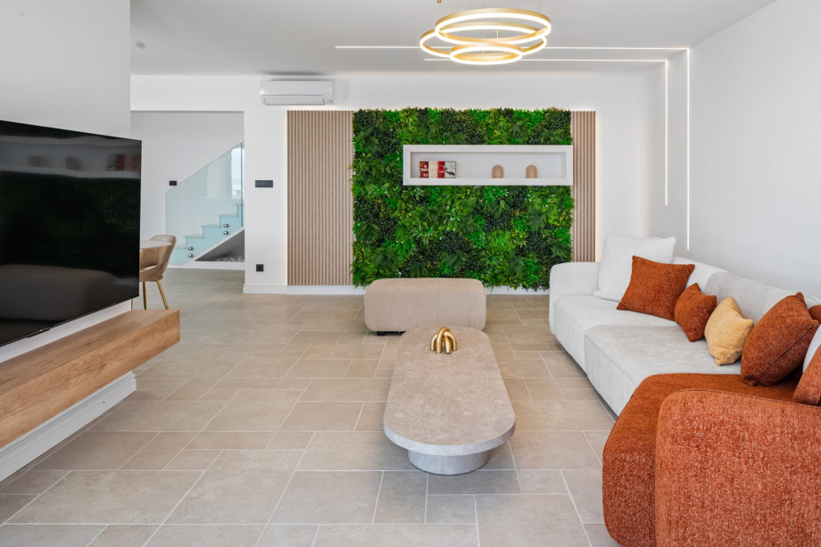 The first floor offers a fully air-conditioned and very comfortable and stylish living and dining area