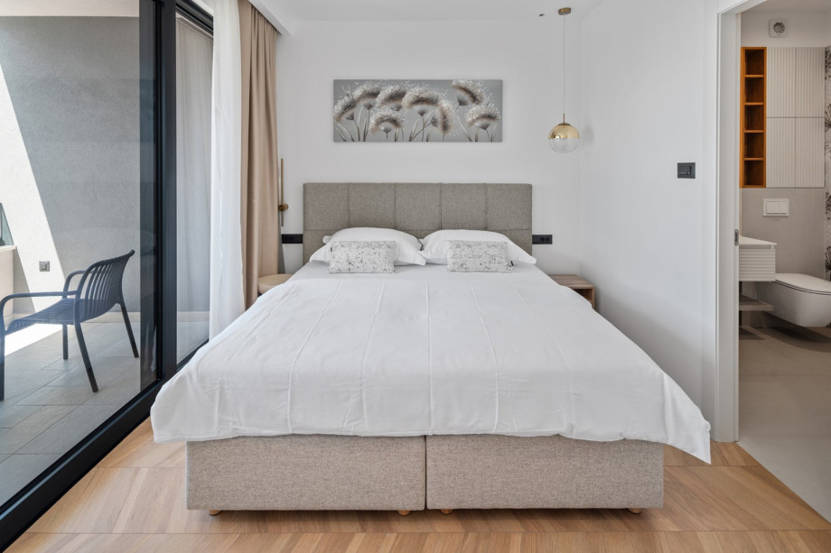 All bedrooms include air conditioning, towels, and premium linens.