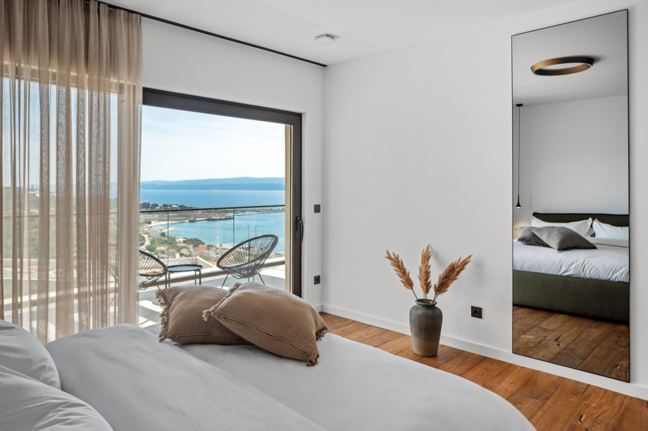 A carefully designed room with air conditioning and a private terrace with a beautiful view of the sea.