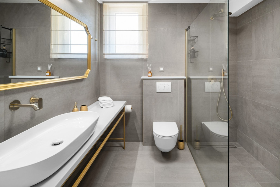 A shared family bathroom with a shower