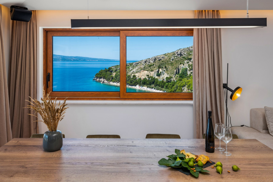 House bar/dining table with a kitchenette (vine cooler,