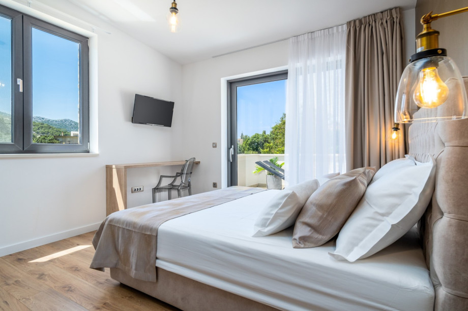 Bedroom No2 also offers a TV, and an A/C