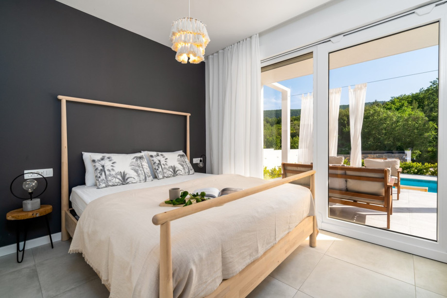 A Bedroom No1 with double bed 160cm x 200cm with pool view and exit the terrace