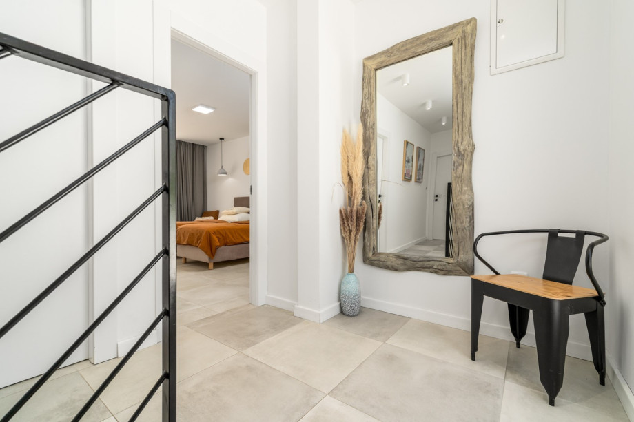 stairs leading to the bedrooms on the first floor