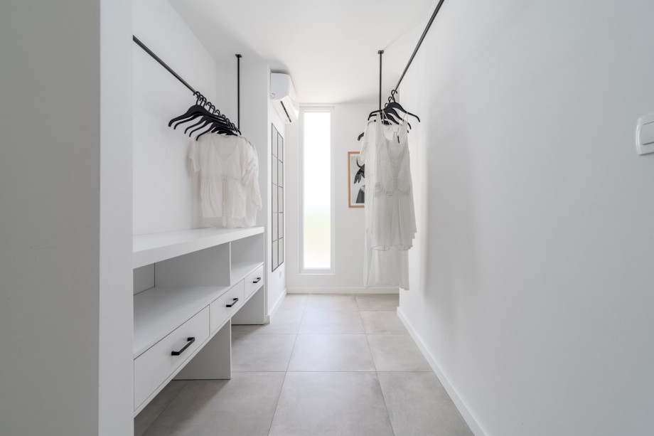 A Master Bedroom No 4 with king-size bed 180cm x 200cm, TV, A/C, ensuite bathroom with shower, a balcony with pool views.