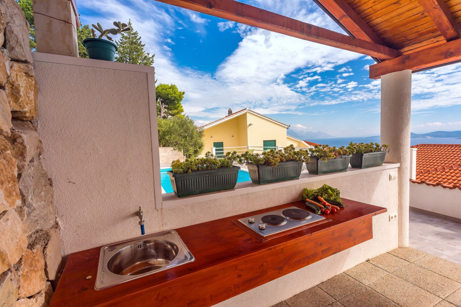 Summer kitchen next to the dinning area