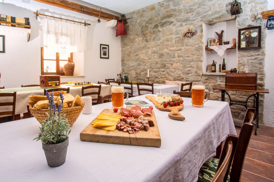 Tavern where owner offers homemade beer and local delicious food (extra charge)