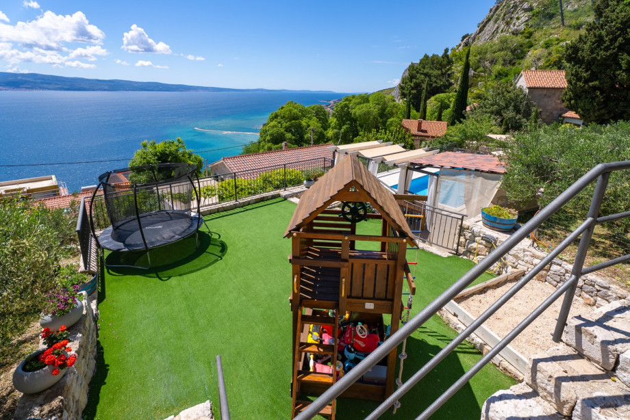 Well-located children playgound right next to the pool area, allowing parents to relax