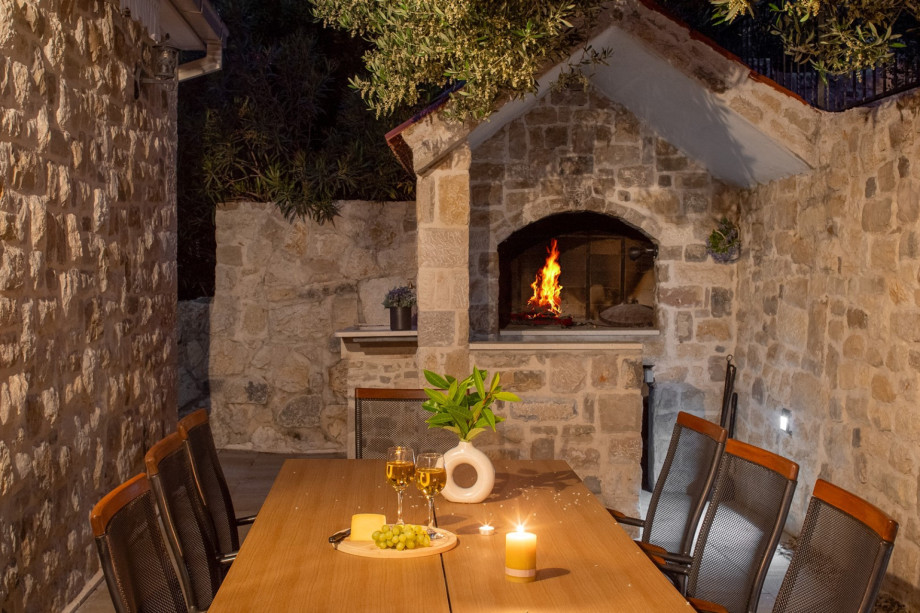 In front of the Villa is a BBQ grill with a dining table. Perfect for quiet evenings