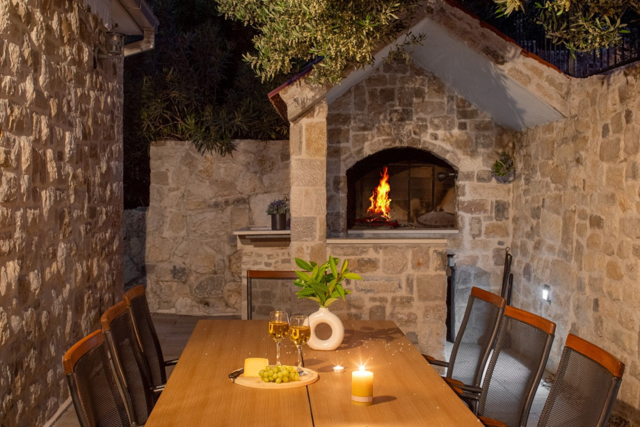 In front of the Villa is a BBQ grill with a dining table. Perfect for quiet evenings