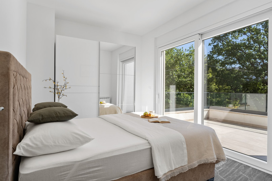 Bedroom No. 3 has a 180cm x 200cm king-size bed, air conditioning, en-suite shower bathroom, and a terrace